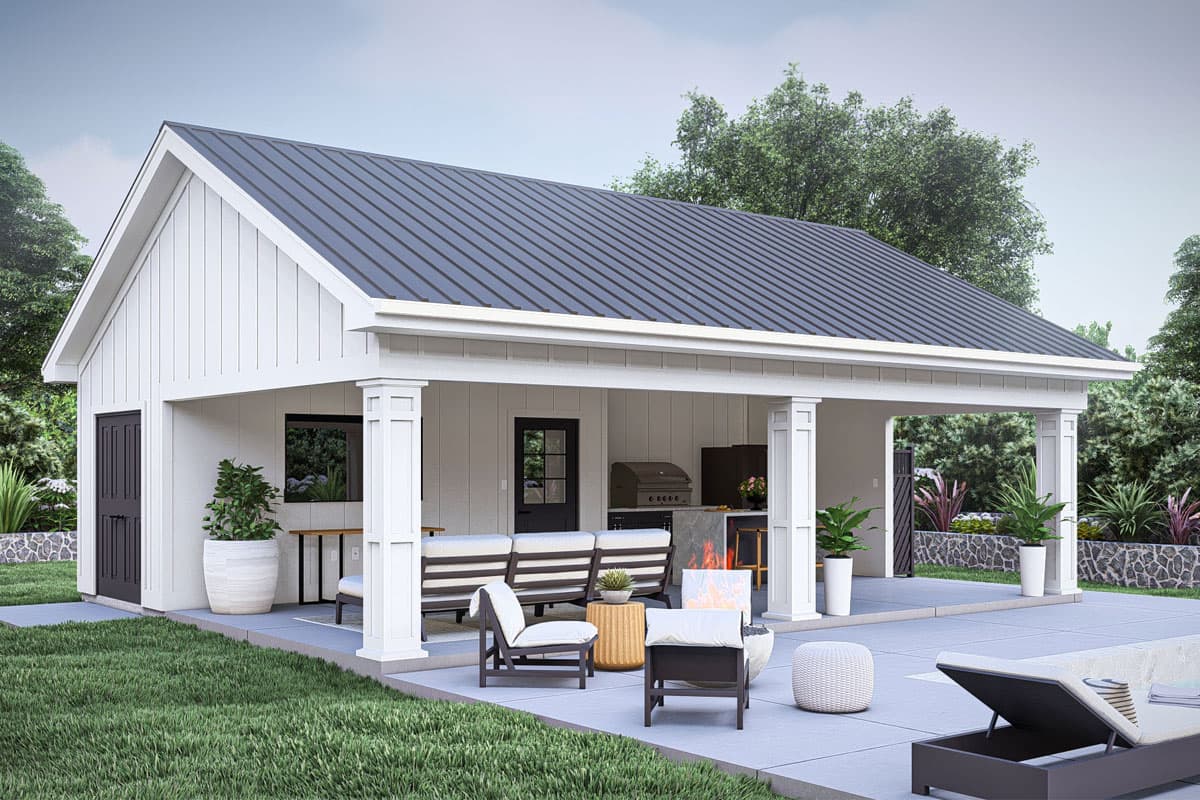 Modern farmhouse style outdoor living space with covered patio, outdoor kitchen, fireplace, and seating.