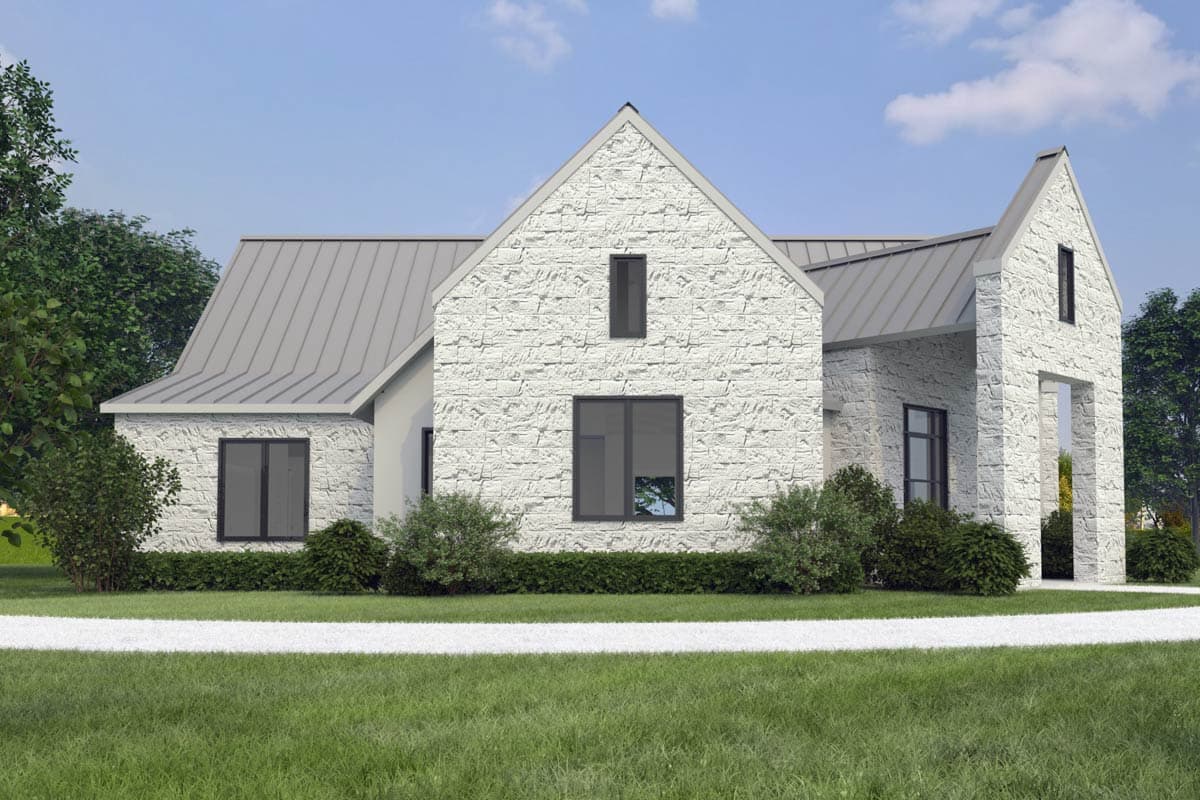 House plan exterior featuring white stone facade, metal gable roofs, and modern dark windows.