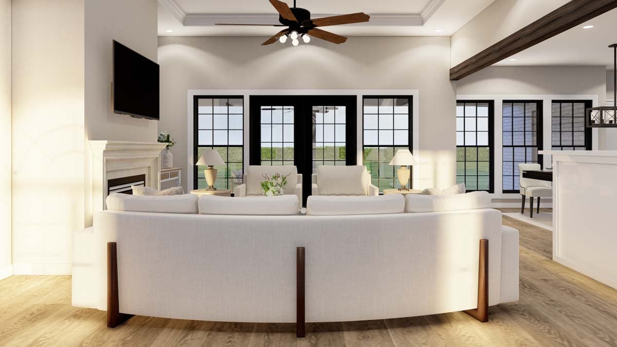 Interior rendering: Great room with fireplace, coffered ceiling, exposed beam, and large windows.