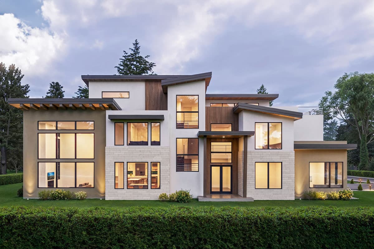 House plan exterior. Modern style, two-story home with flat and angled rooflines. Features include large windows, wood accents, and a covered entry.