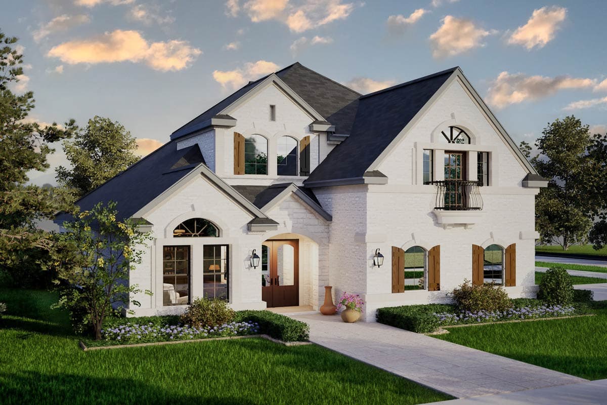 House plan exterior of a two-story residence with white brick, arched windows, gable rooflines, and a covered entry.