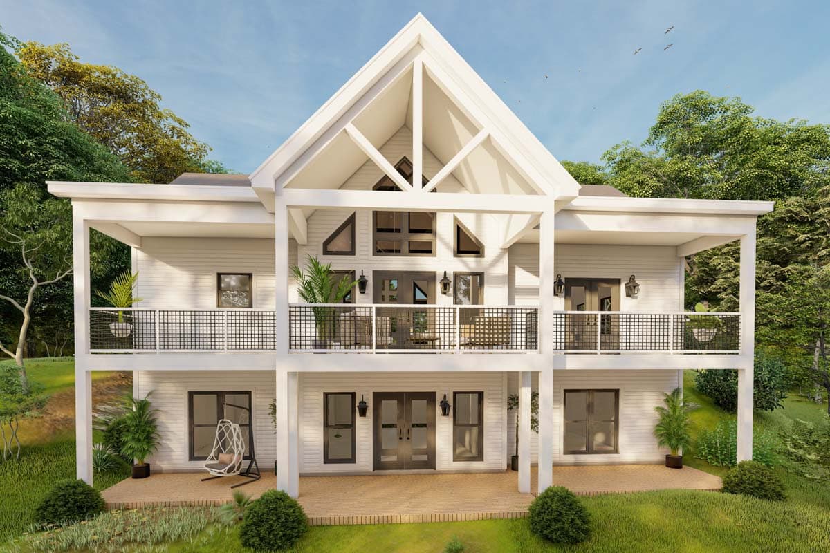 House plan exterior: Modern two-story with prominent gables, wraparound balconies, and abundant windows.