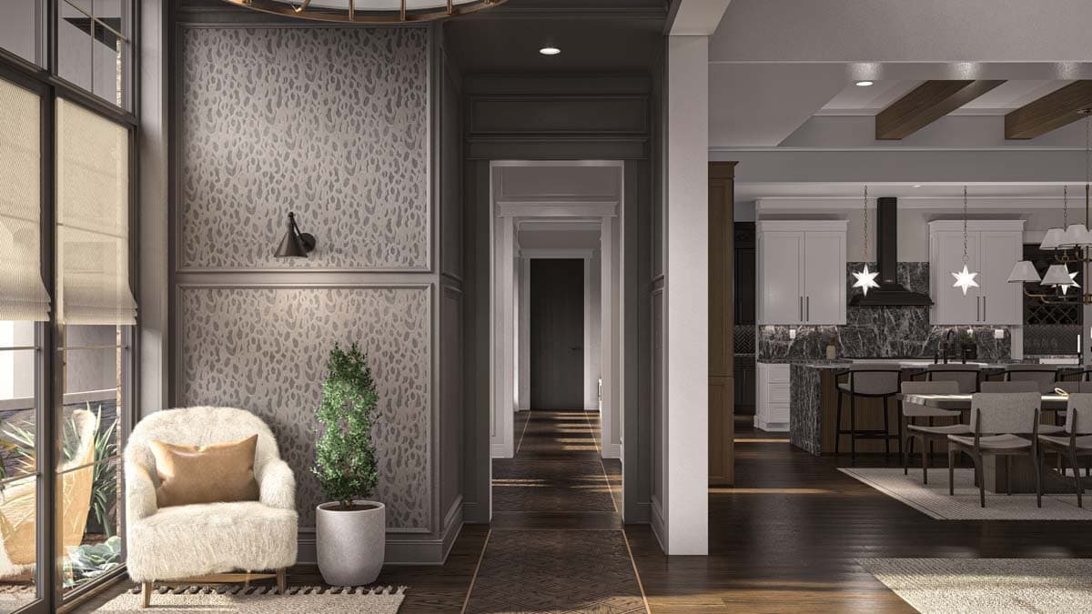 Interior view showing a hallway leading to a kitchen with an island, white cabinets, dark marble backsplash, and exposed ceiling beams.