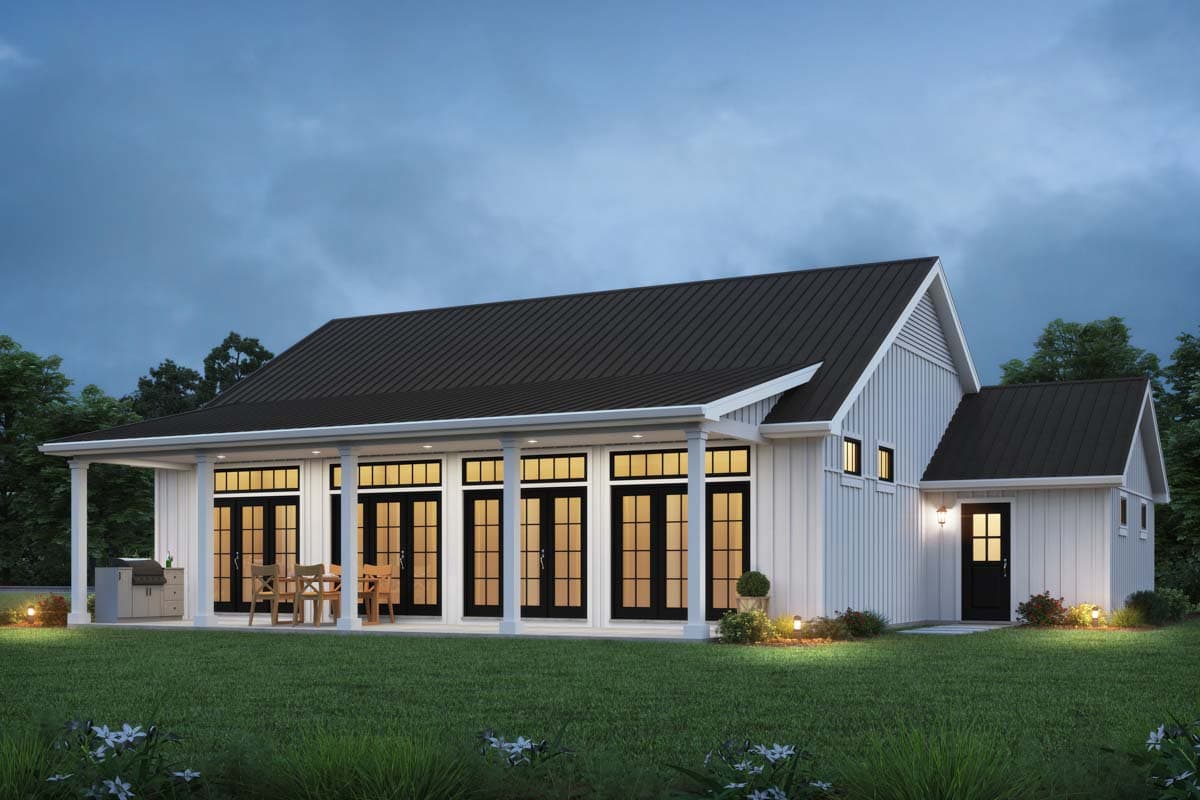 Modern Farmhouse house plan exterior with a covered porch, white board and batten siding, and a standing seam metal roof.