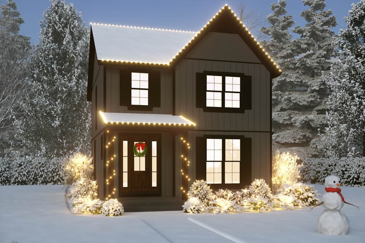 Two-story house plan exterior with a prominent gable, covered entryway, shutters, and holiday lights.