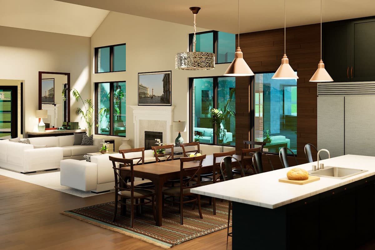 Open concept living, dining, and kitchen area with vaulted ceilings, a fireplace, large windows, and a kitchen island.