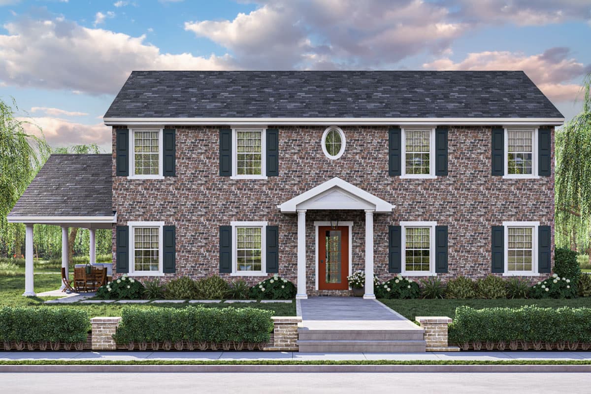 House plan exterior with two stories. Features include brick facade, a portico, oval window, and a covered side porch.