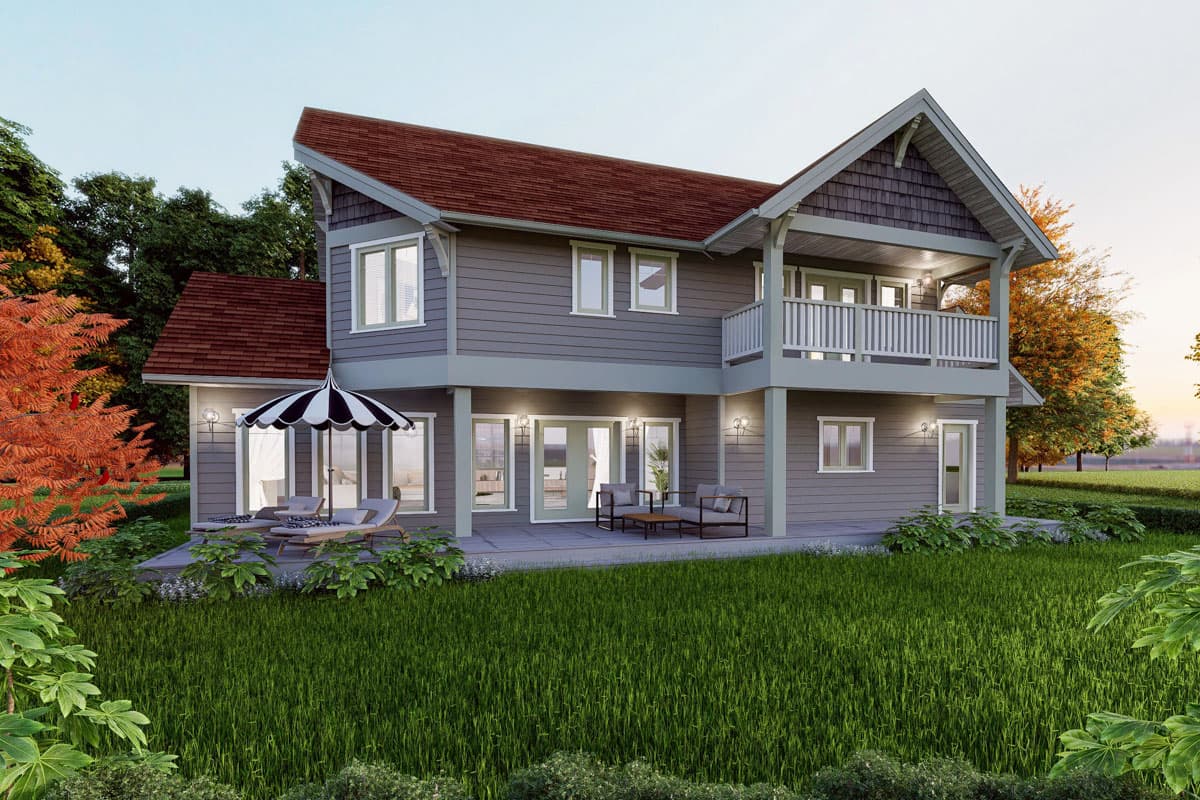 House plan exterior: two-story home with a prominent gable, upper balcony with railing, and lower-level patio with doors.