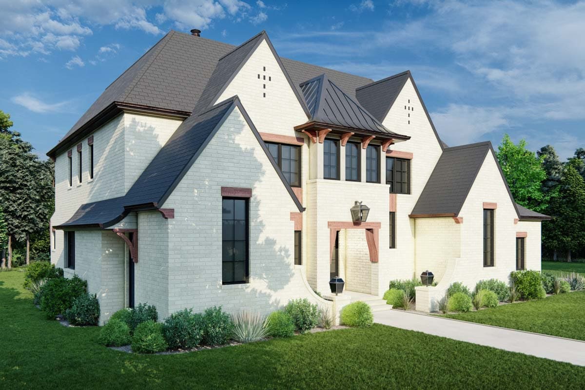 House plan exterior: Two-story, white brick home with multiple gables, dormers, dark shingle roof, and decorative wood brackets.
