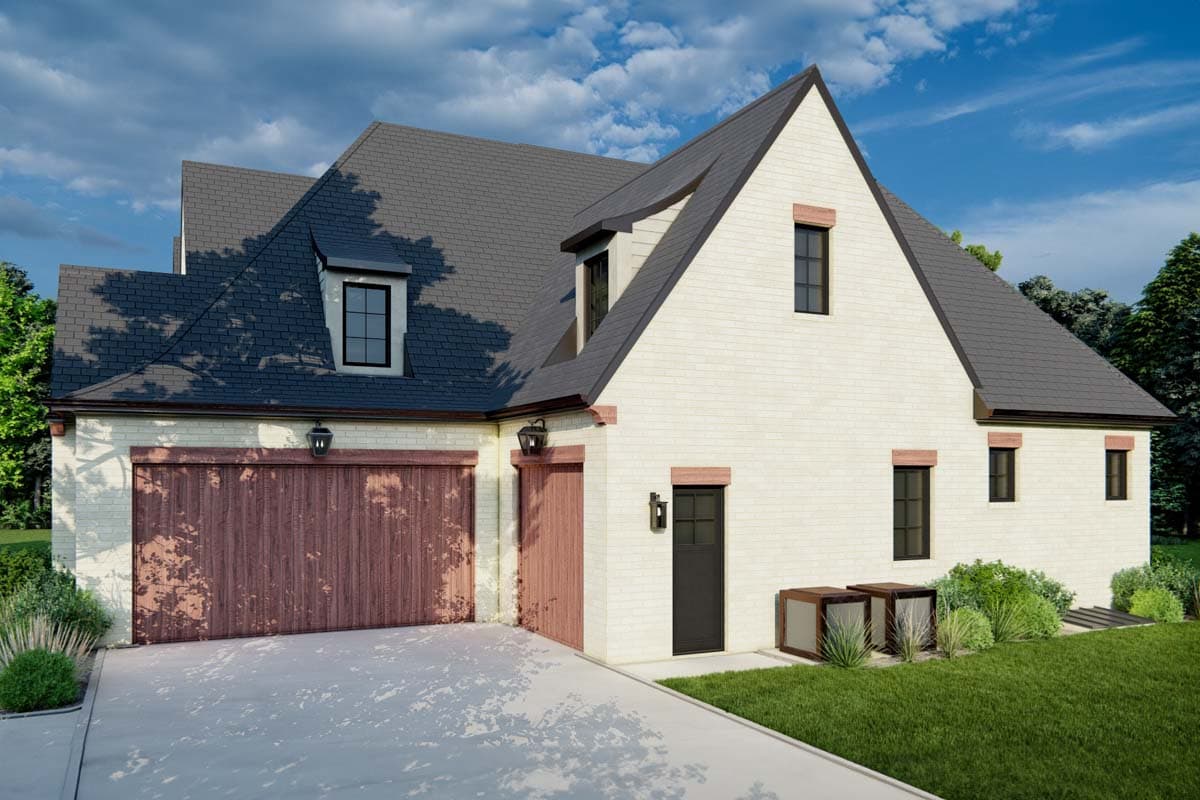 House plan exterior: Two-story modern farmhouse with gable roof, dormer, brick facade, and double garage.