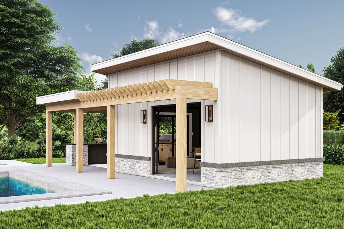 Modern house plan exterior with white vertical siding, stone base, and a wooden pergola covering an outdoor kitchen and patio.