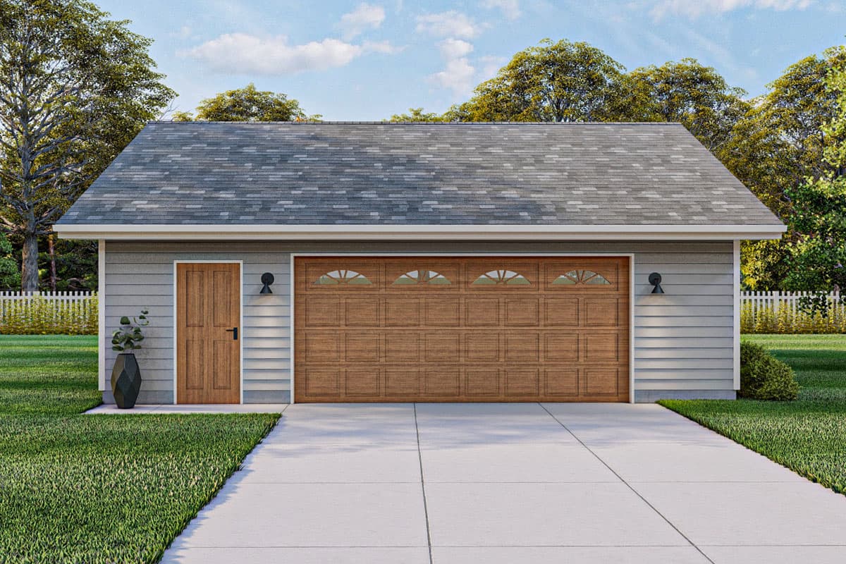 Two-car garage with a wood-grain door featuring arched windows, light gray siding, and a gray asphalt shingle roof.
