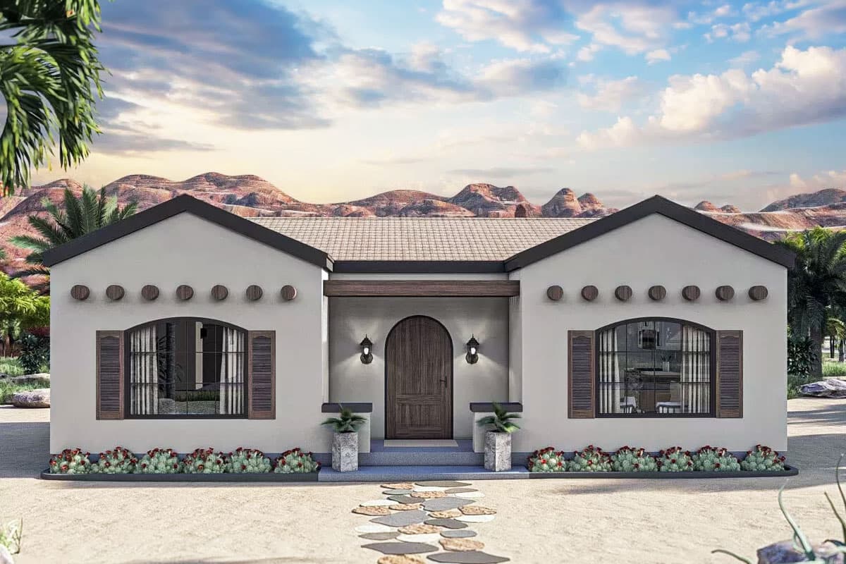 House plan exterior featuring a one-story, stucco facade with a gable roof, arched front door, and shuttered windows. Includes a stone walkway.