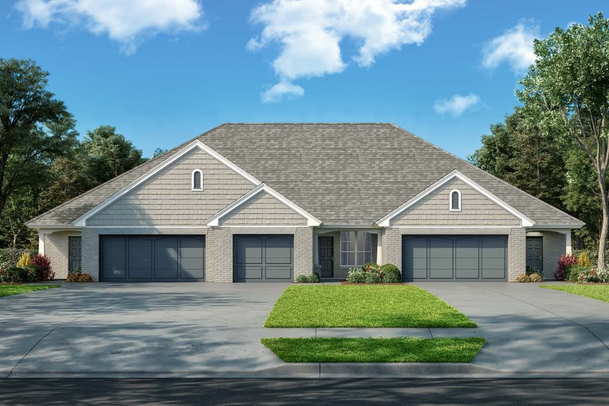 House plan exterior. One-story design with three-car garage. Features include gabled roof, dormers, and brick facade.