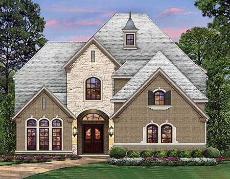 House plan exterior featuring a light stone facade, brick siding, arched windows, a prominent dormer, and a steeply pitched roof.