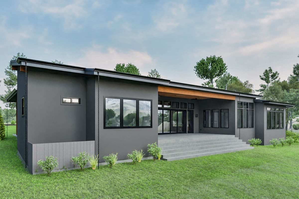 Modern house plan exterior with a low-pitched roof, large windows, and covered patio accessed by wide stairs.