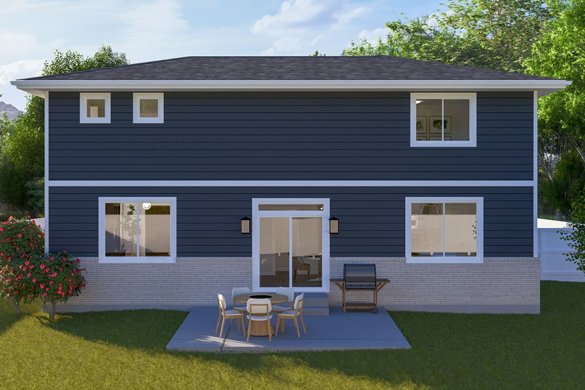 Two-story house plan exterior with dark blue siding, white trim, brick base, and sliding glass doors to patio.