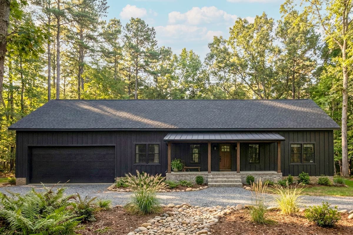 House plan exterior. One-story Modern Farmhouse with a metal roof. Features include a front porch, garage, and symmetrical window placement.