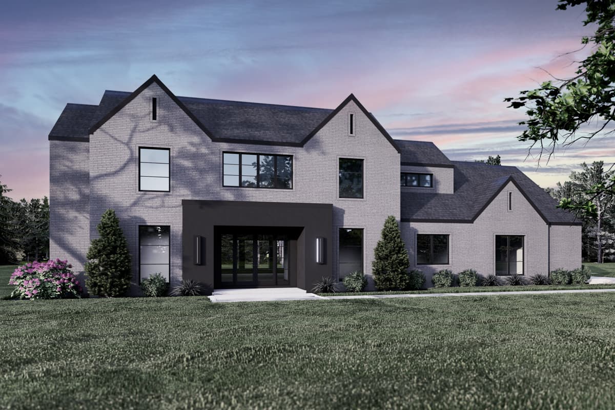 House plan exterior with two stories. Features include multiple gables, a covered entryway, and large windows. Gray brick facade and dark roof.