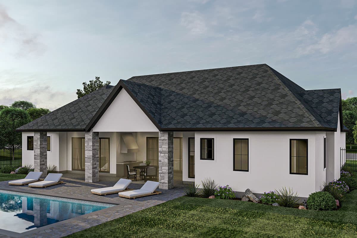 House plan exterior: one-story modern home with covered outdoor kitchen, stone accents, and gabled roofline.