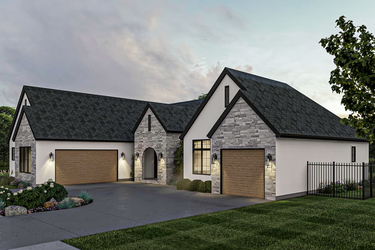 House plan exterior: Modern home with stone accents, two garages, and a prominent arched entryway.