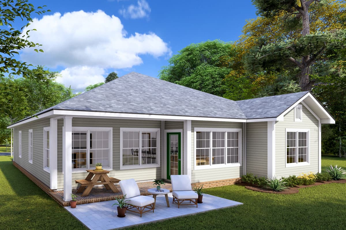 House plan exterior: Ranch style, one story with covered porch, prominent gables, and numerous windows.