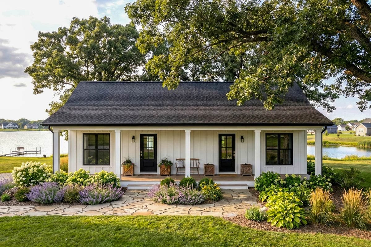 House plan exterior showing a one-story Modern Farmhouse with a gabled roof, covered porch, and black-framed windows and doors.