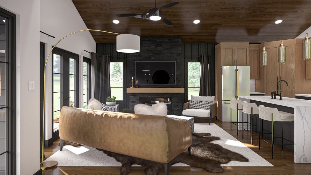 Open concept living and kitchen area with fireplace, island seating, wood ceiling, and large windows.