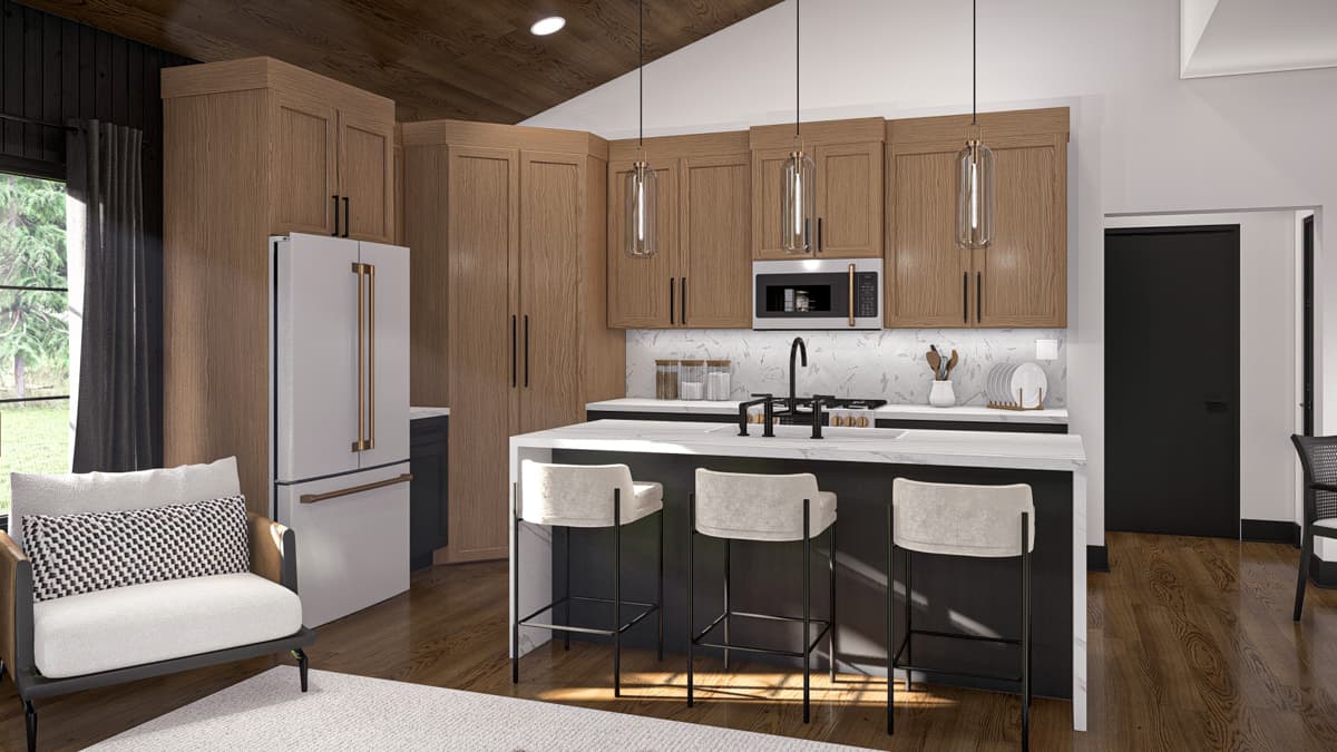 Modern kitchen with light wood cabinets, white marble island with seating, and stainless steel appliances.