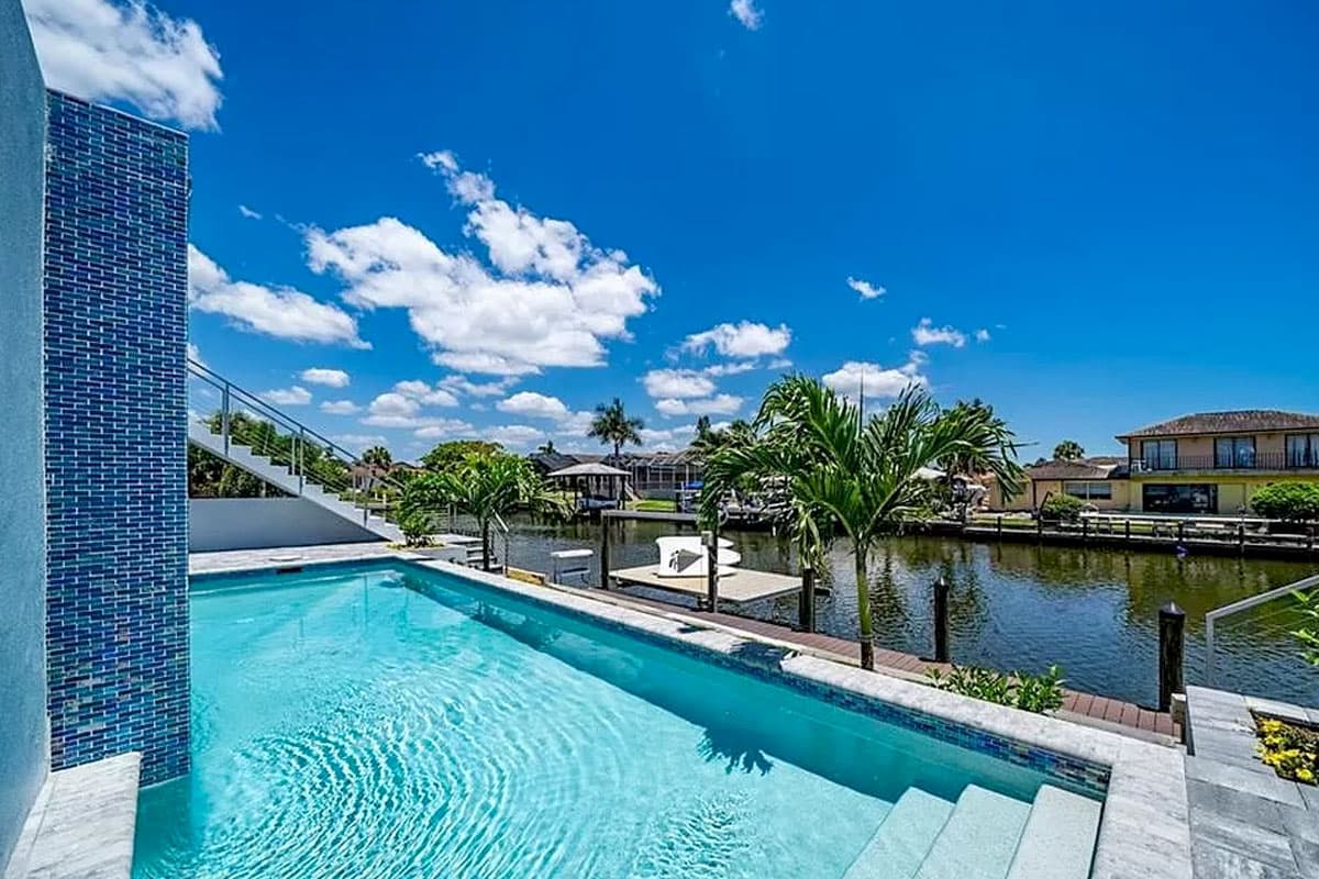 Plan 31857DN: Two-Story Coastal Beach House Plan with Two-Story Great Room - 5102 Sq Ft - Image #5 - Coastal, Coastal Contemporary, Florida-Style