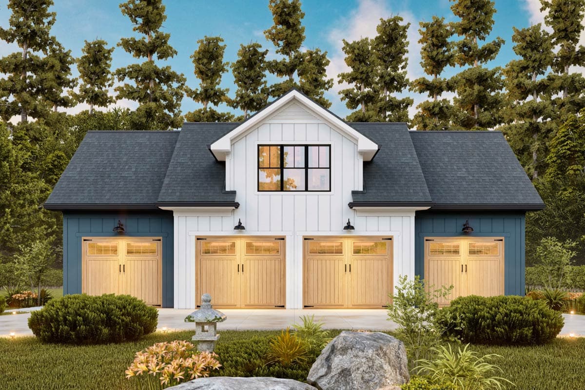 Exterior shot of a modern farmhouse garage with blue and white siding, light wood garage doors, and lush landscaping.