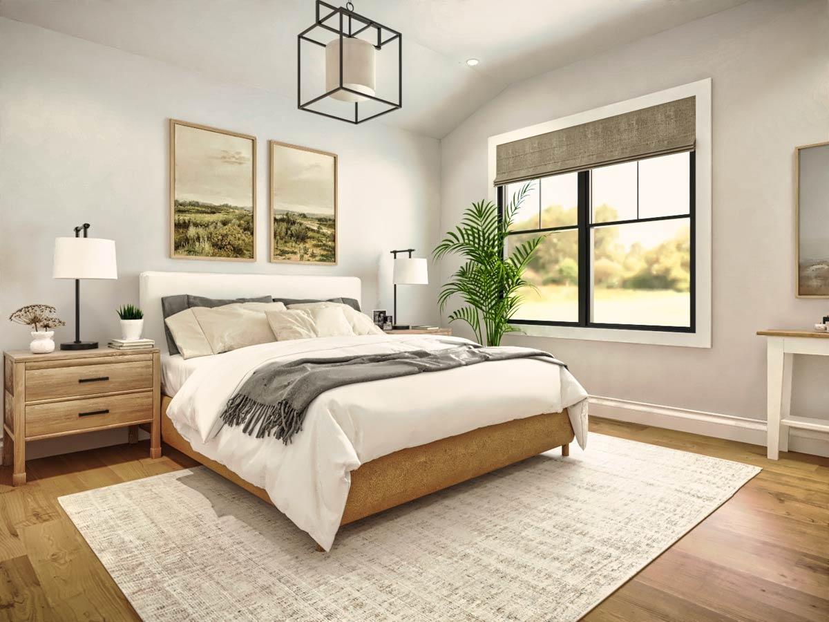 Bright, modern bedroom with bed, nightstands, rug, and large window overlooking a landscape.