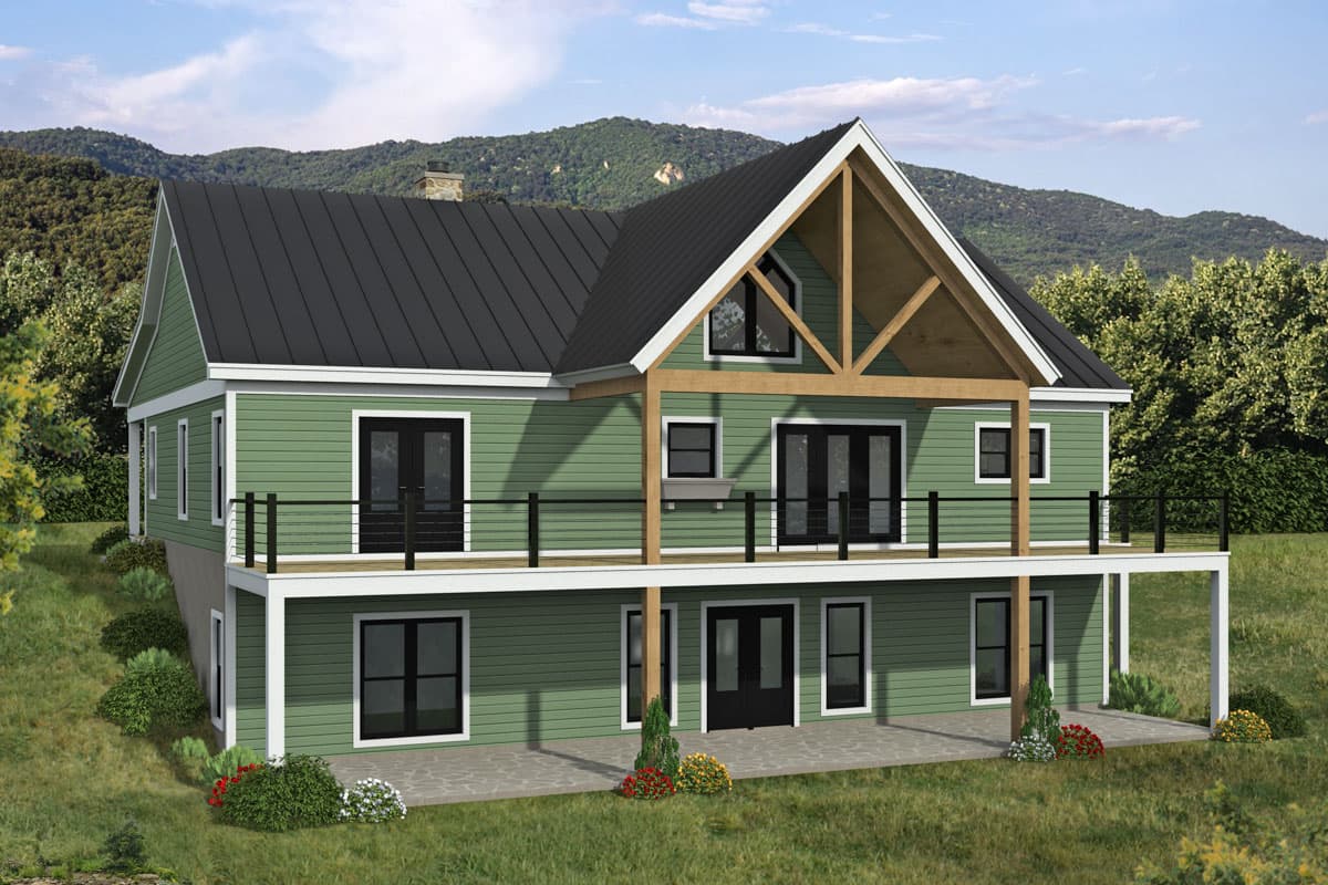 House plan exterior: two-story green house with black metal roof, extensive deck, and exposed rafter beams on the upper gable.