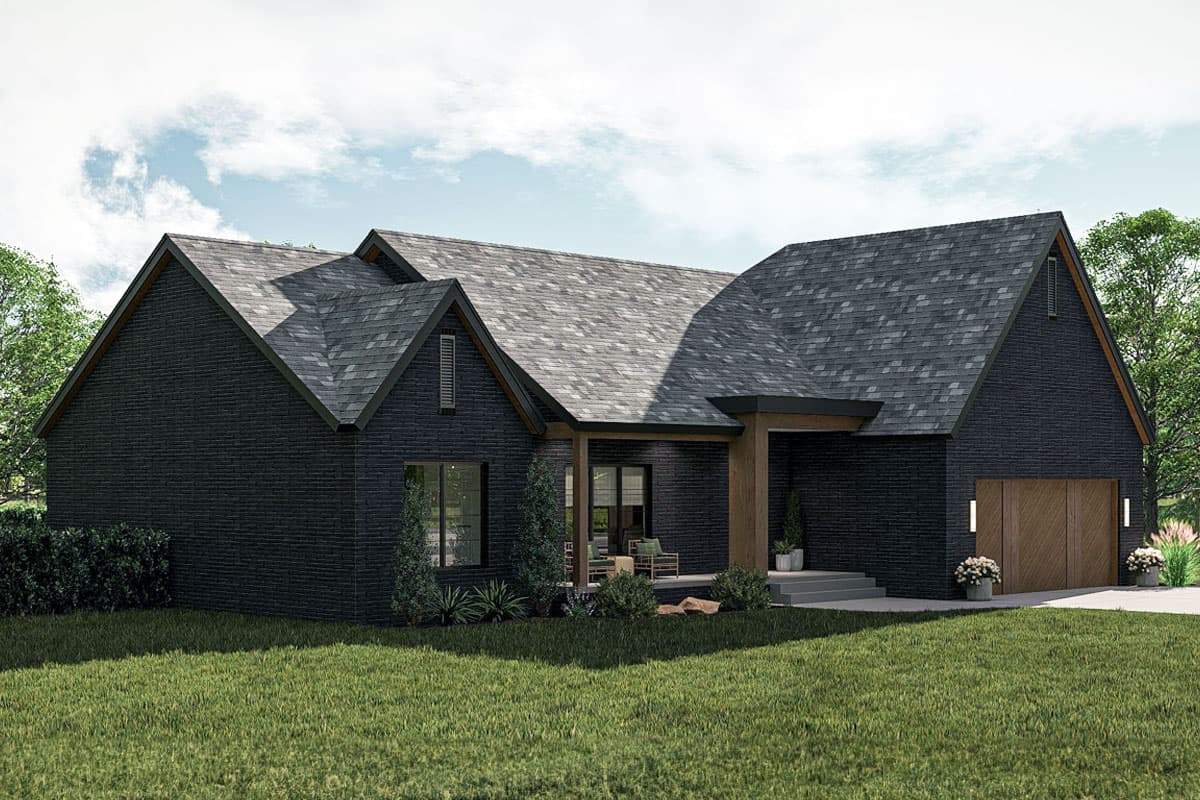 Modern Farmhouse style house plan exterior with dark brick, multiple gables, covered entry, and wood garage door.