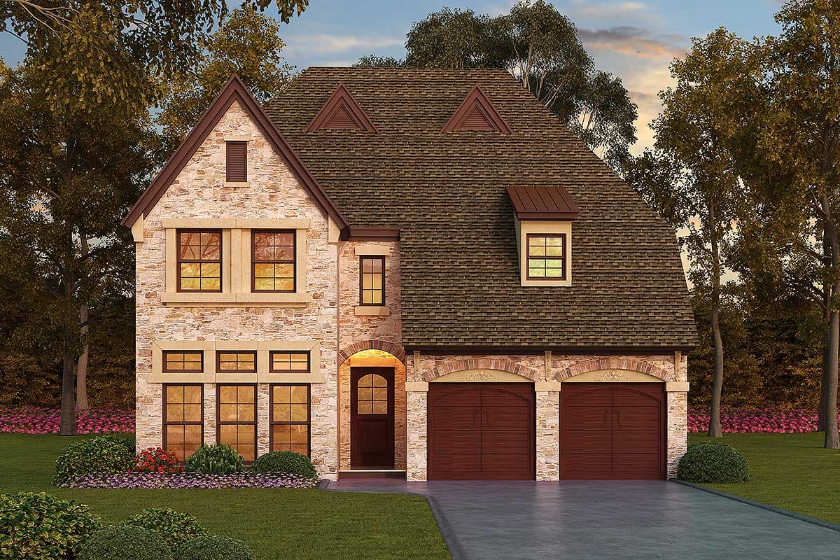 House plan exterior: Two-story stone residence with a dormer, arched entry, and a side-entry, two-car garage.