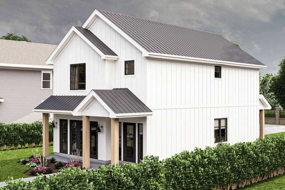 Modern Farmhouse house plan exterior: two stories, white board and batten siding, gabled roofs, and covered porch with wood columns.