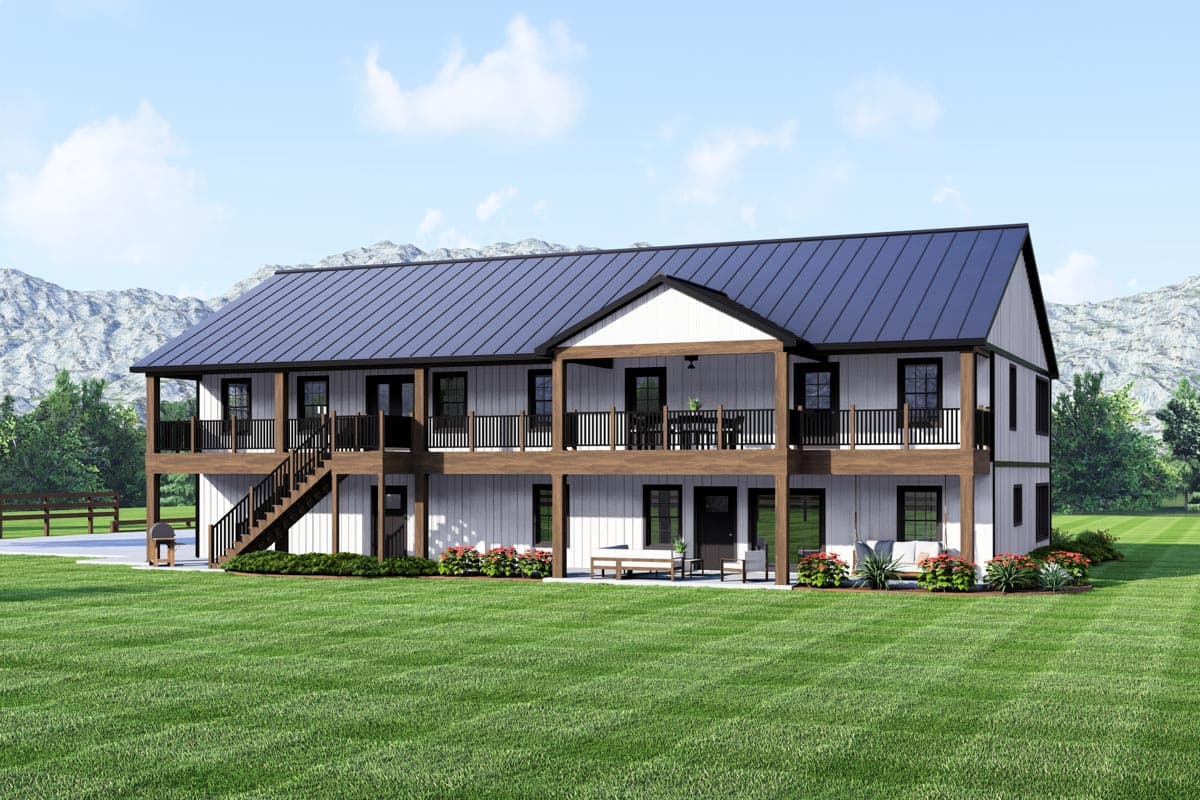 Modern Farmhouse house plan exterior, two stories, wrap-around porch, prominent gables, and metal roof.