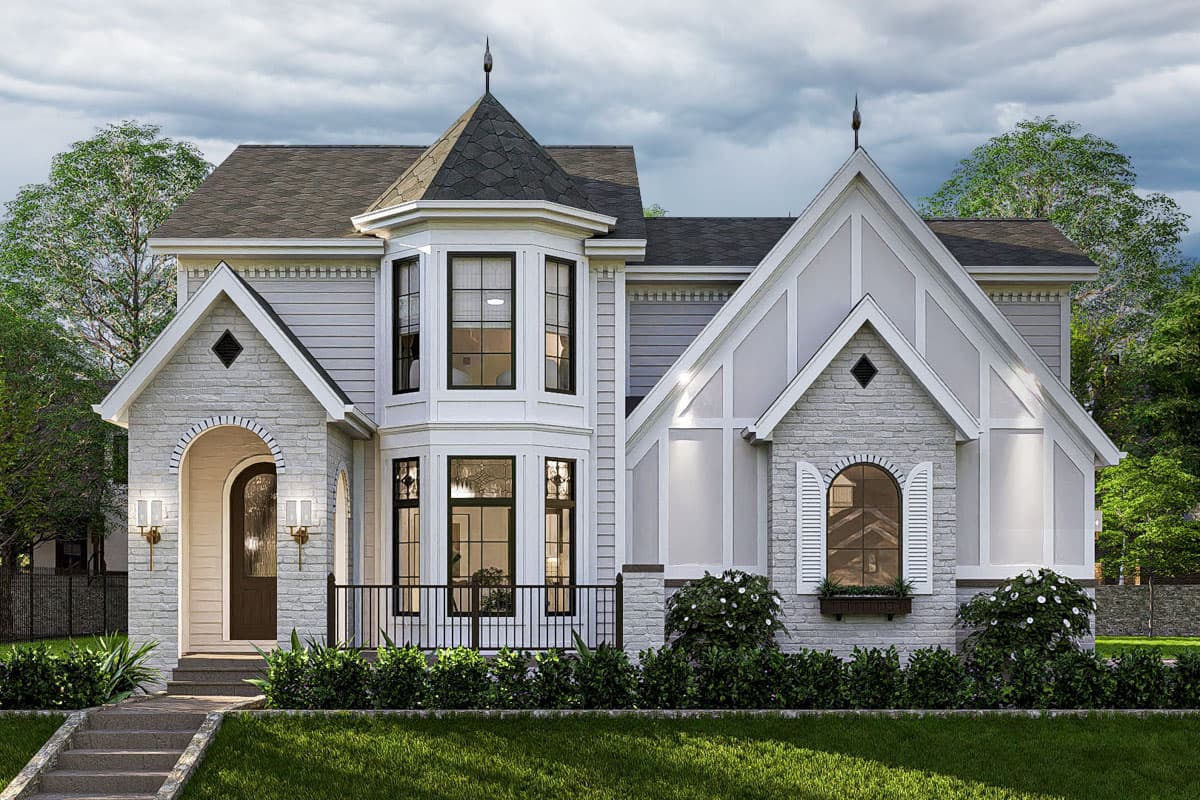 House plan exterior. Two-story Tudor style with a turret, arched entry, decorative gables, and steeply pitched roof.