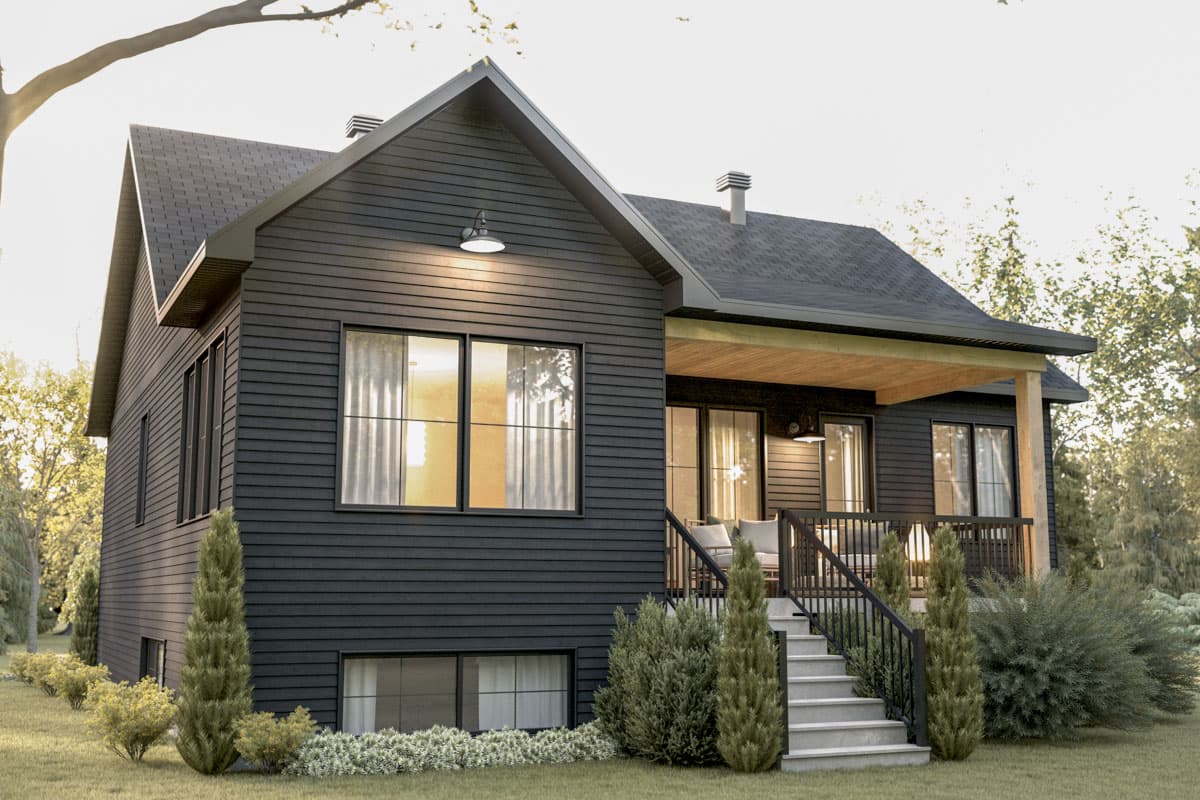 House plan exterior: Modern two-story home with dark siding, gable roof, front porch with wood ceiling, and large windows.