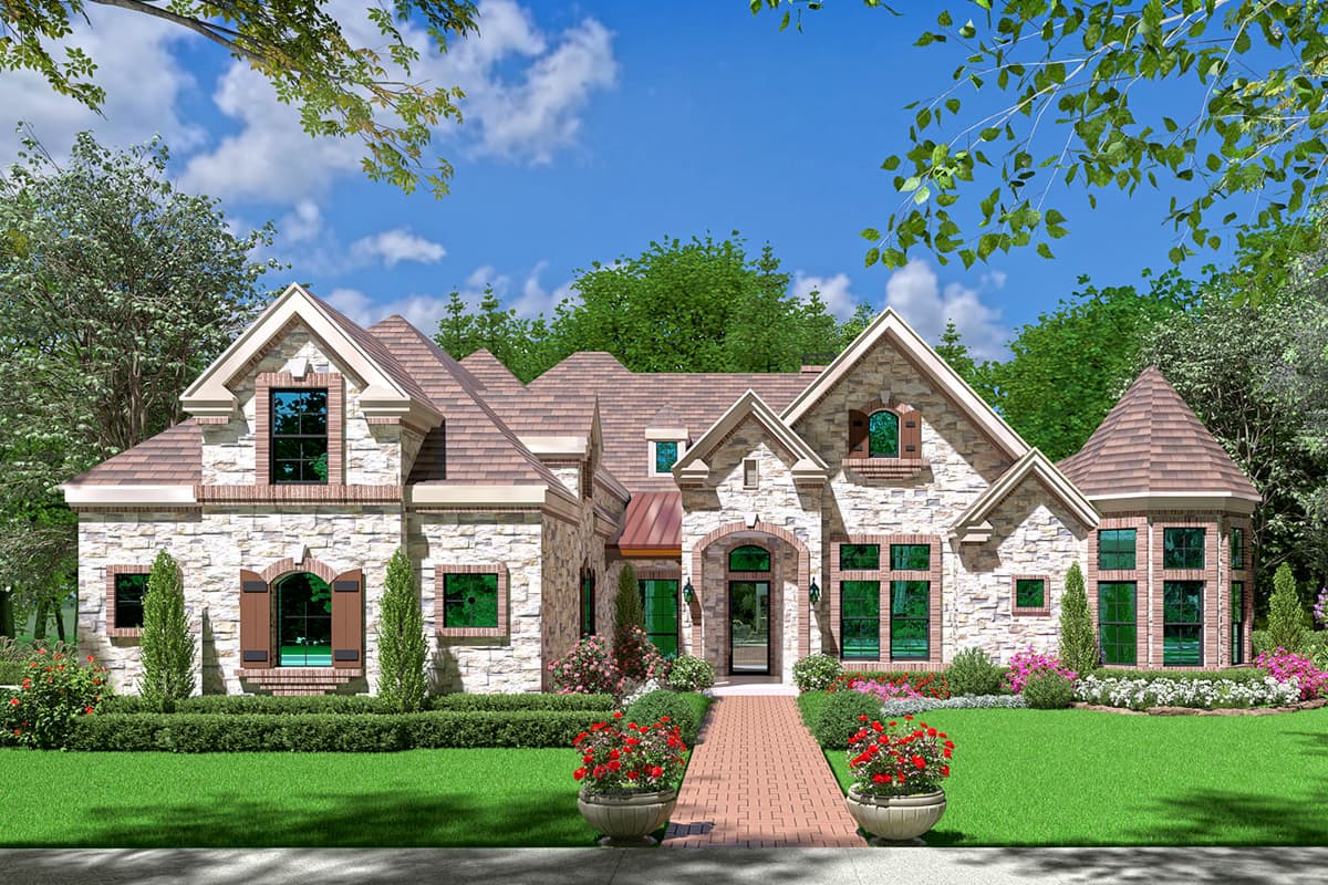 House plan exterior. Two-story home with stone facade, multiple gables, arched entry, and a turret. Brick walkway leads to the entrance.