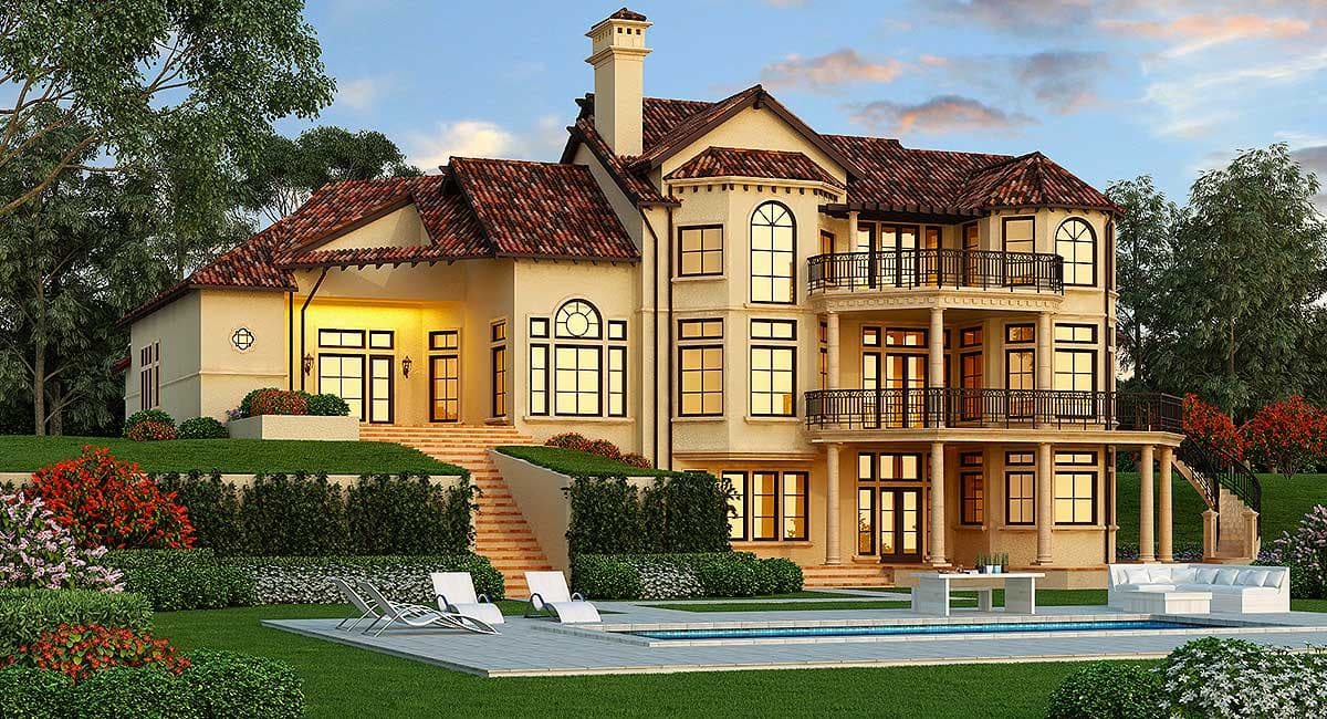 House plan exterior: Mediterranean style, multiple stories, arched windows, balconies, clay tile roof, and a prominent chimney.