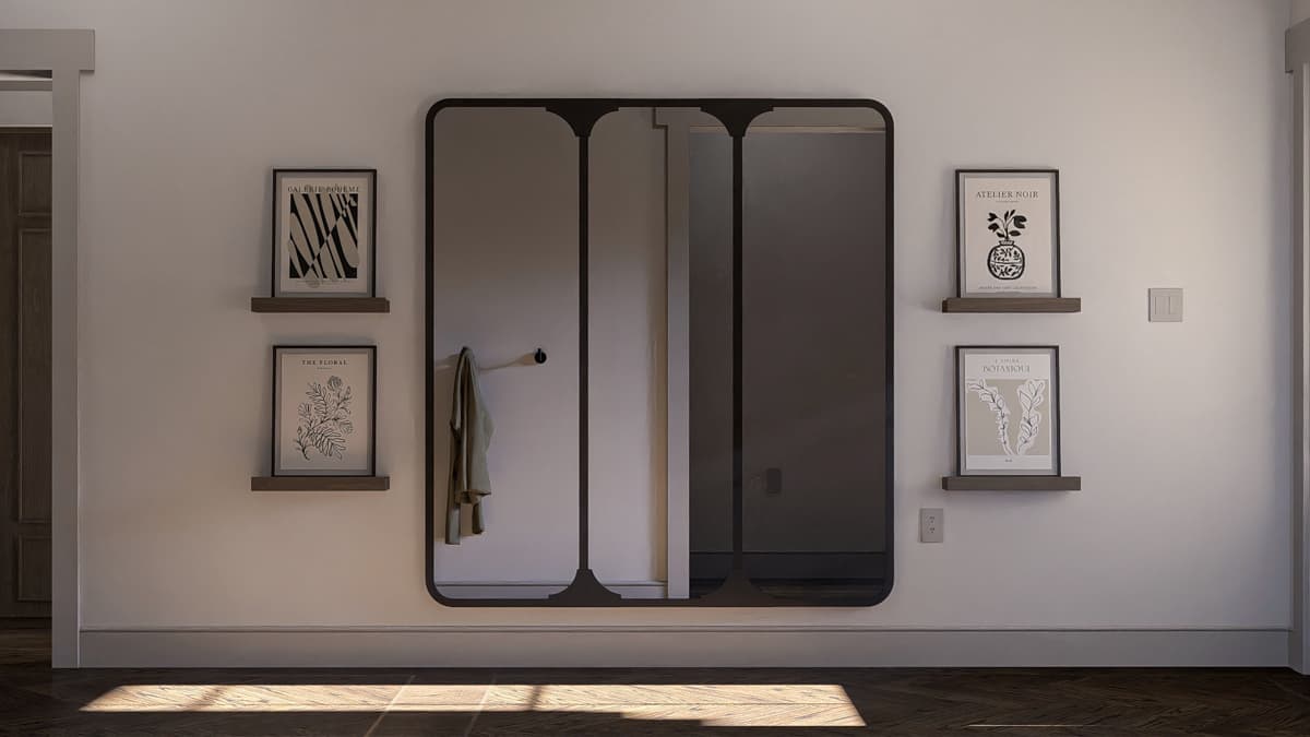 Interior hallway with a large, multi-paneled mirror, two framed prints on each side, and a coat hook.