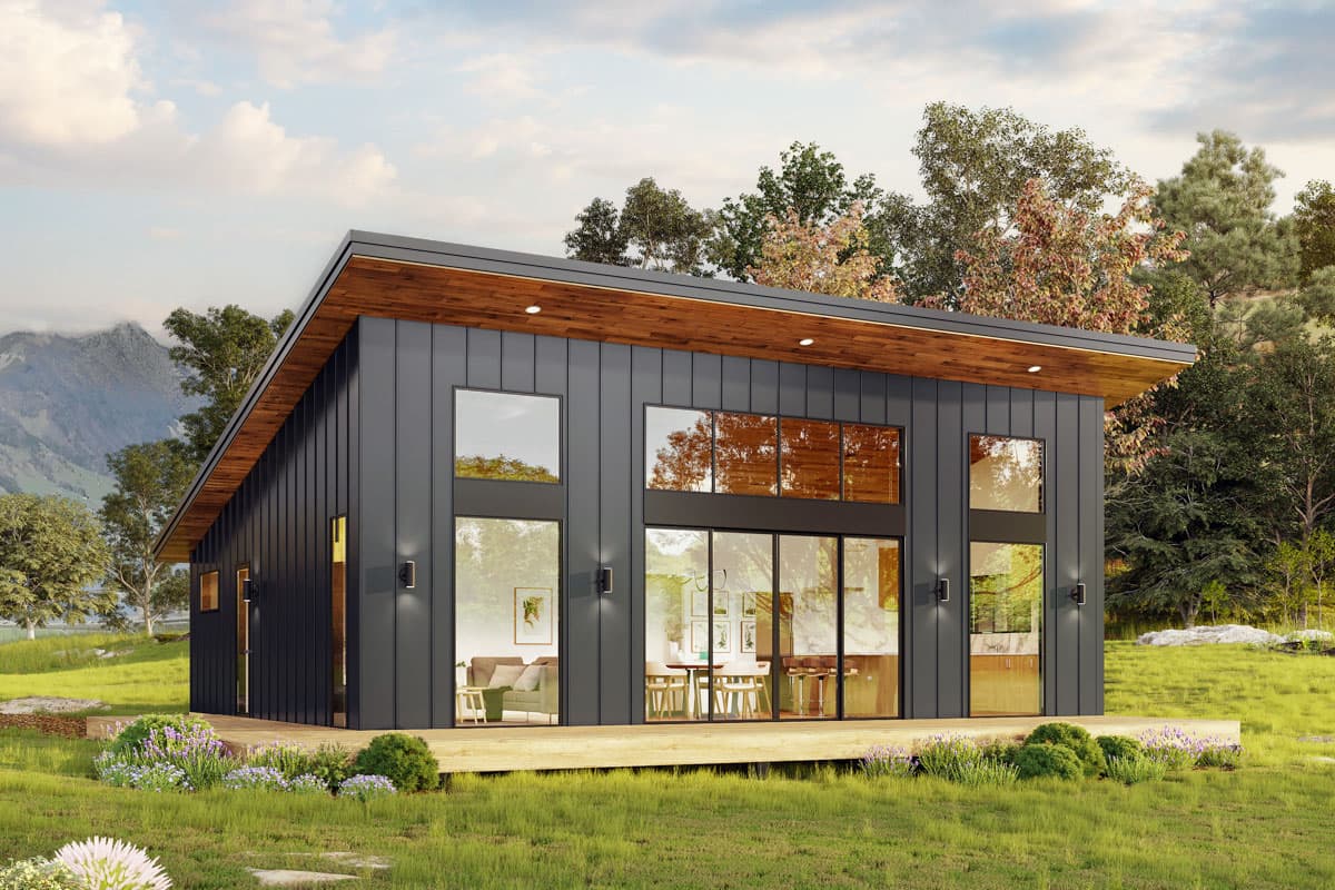 House plan exterior with a modern design featuring a single story, flat roof, and large windows. Exterior includes a wood deck and metal siding.