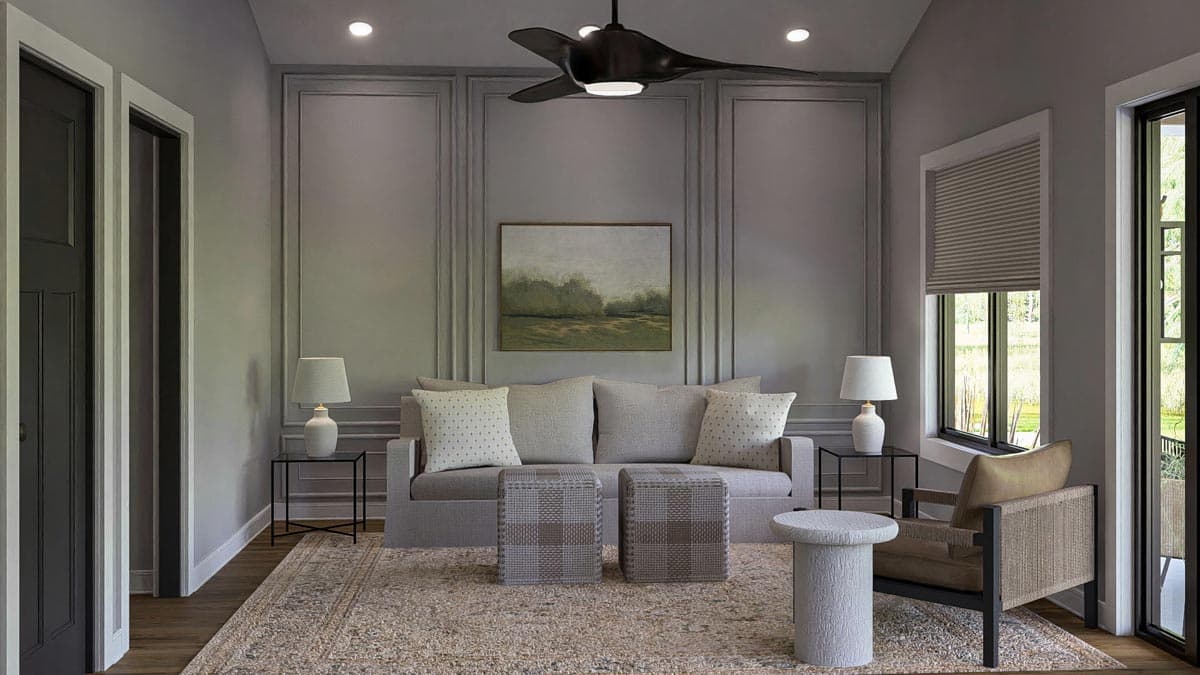 Interior rendering of a living area with a sofa, two ottomans, a chair, artwork, and panel molding.