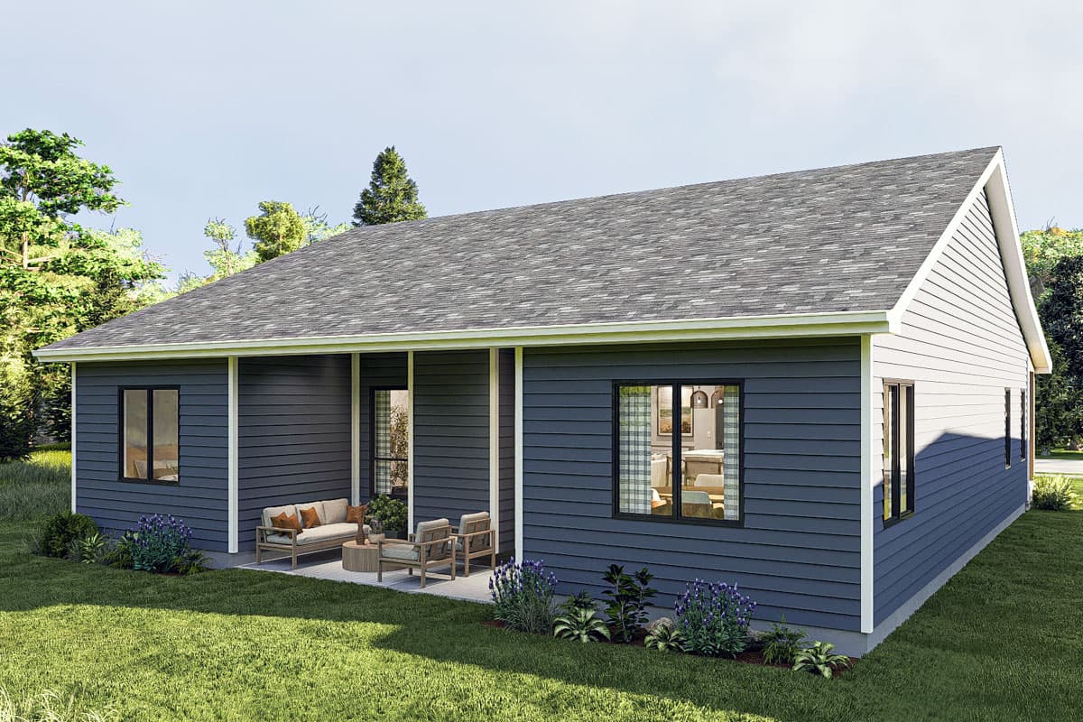 House plan exterior: One-story modern home with dark horizontal siding, covered patio with seating, and gabled roof.