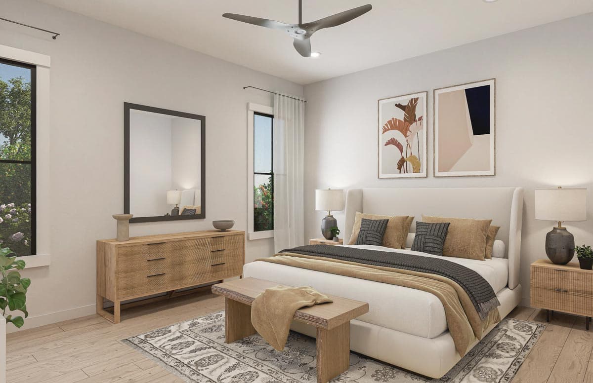 Modern bedroom with king bed, dresser, large windows, ceiling fan, and botanical art.
