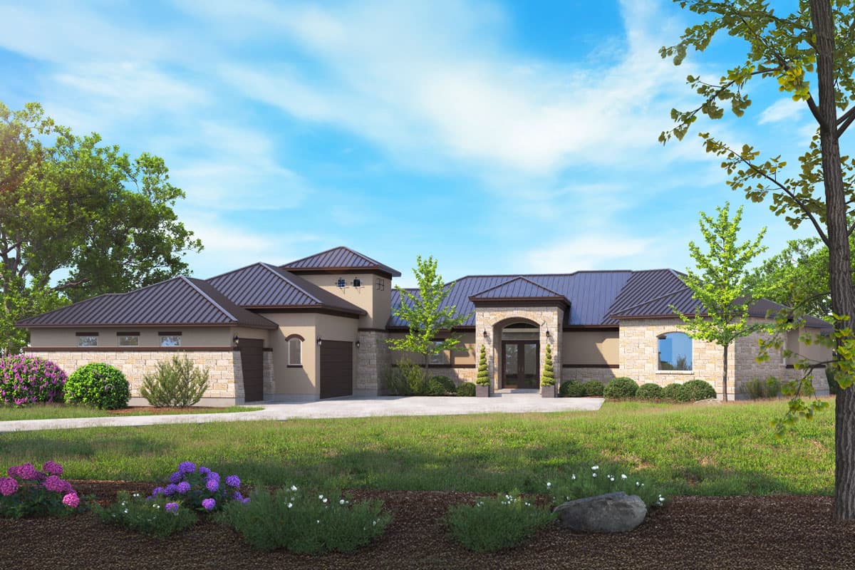 House plan exterior with stone accents, arched entryway, and metal roof. Features a garage and mature landscaping.