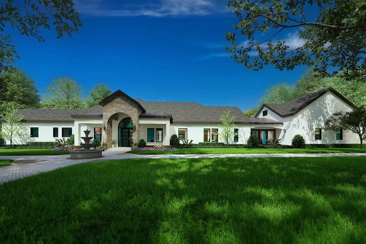 House plan exterior with two stories, stone archway over entry, multiple gables, and a slate roof. Landscaped front yard with fountain.