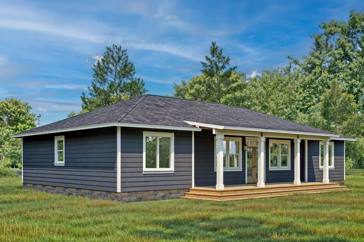House plan exterior of a one-story home with a covered front porch, dark siding, and stone foundation.