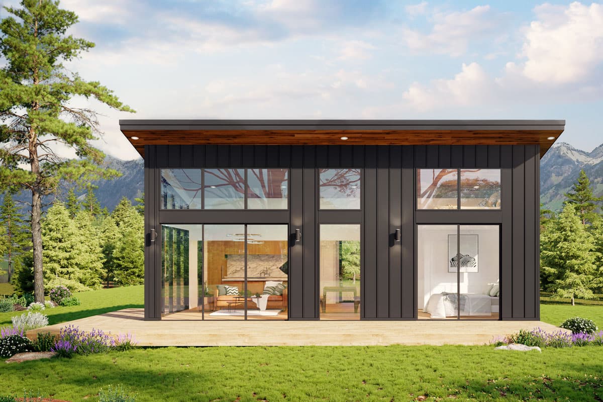 Modern house plan exterior with dark vertical siding, flat roof with wood soffit, and floor-to-ceiling windows.